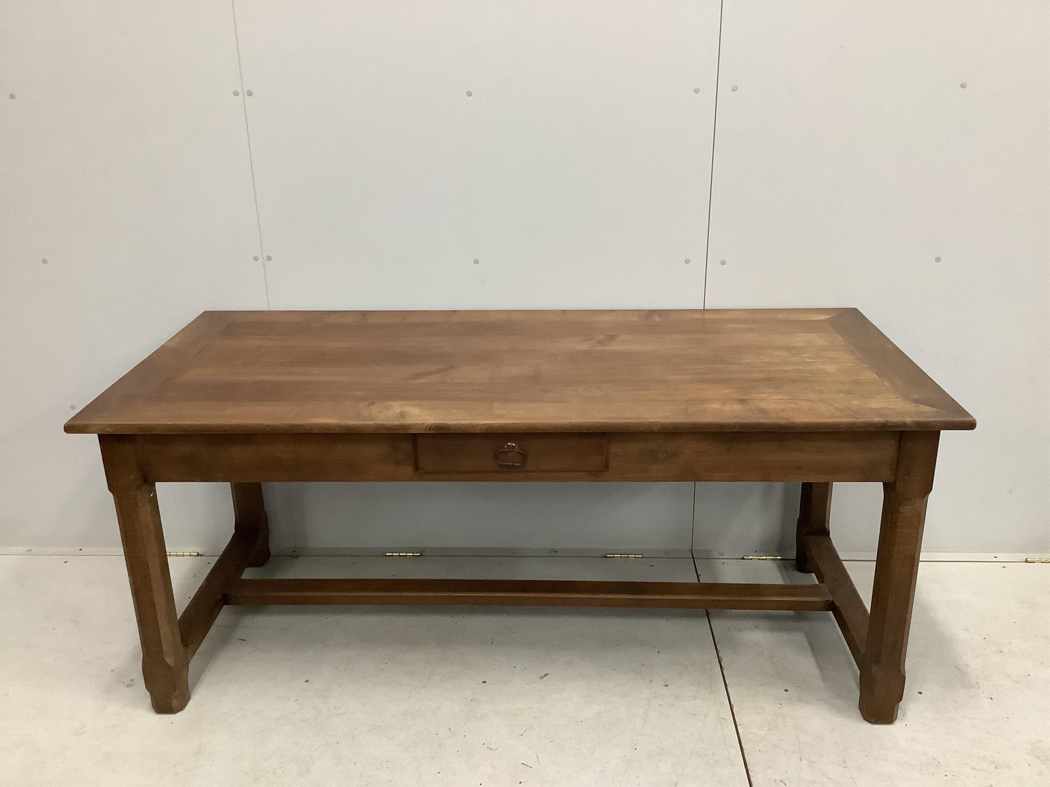 A rectangular French cherry kitchen table, width 179cm, depth 79cm, height 76cm. Condition - fair to good